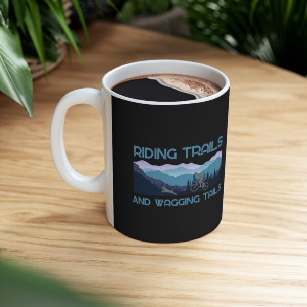 Riding Trails And Wagging Tails mug on desk